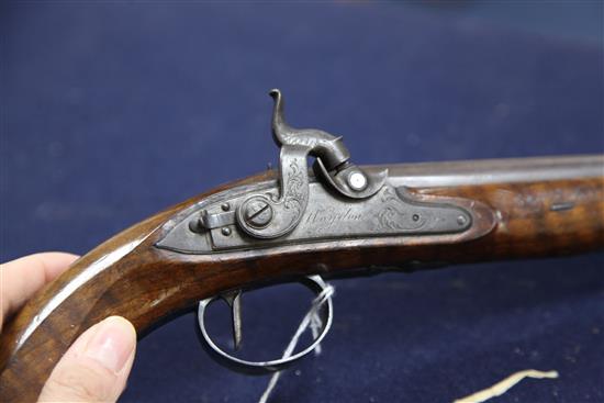 A pair of early 19th century percussion lock pistols, by Wogdon of London, 14in.